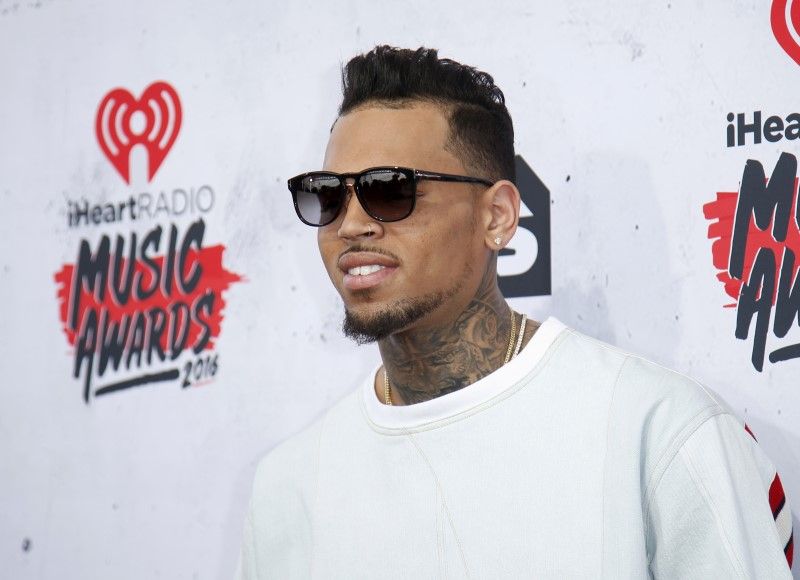 Chris Brown was arrested on suspicion of assault with a deadly weapon yesterday after a daylong standoff at his Los Angeles home. u00e2u20acu2022 Reuters pic