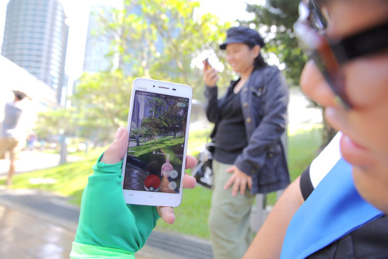 Pokemon Go players joining the quest to catch cartoon monsters in KLCC park, Kuala Lumpur, Aug 7, 2016. u00e2u20acu201d Picture by Choo Choy May