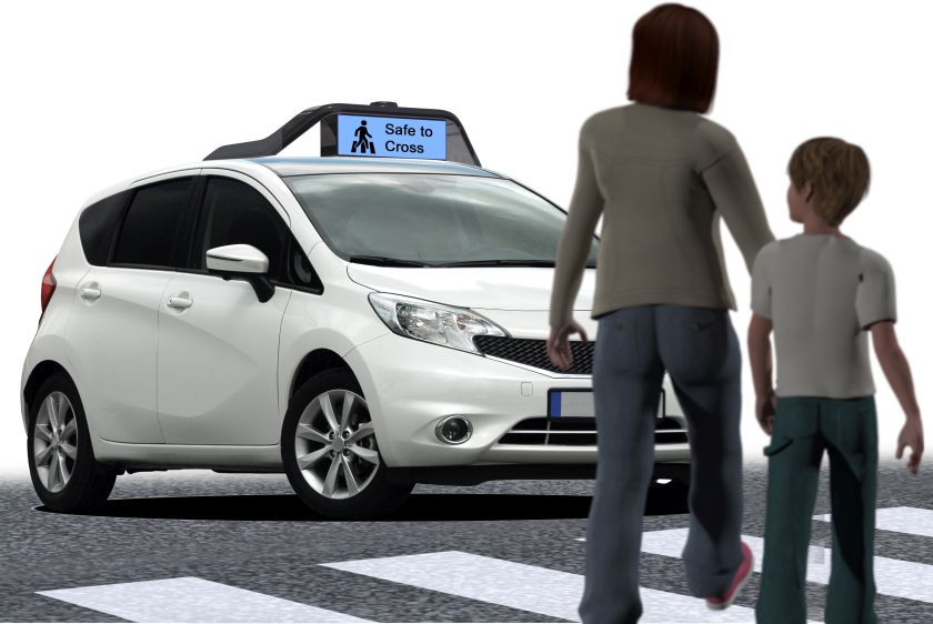 A driverless car with Drive.ai technology is depicted showing how it might communicate with pedestrians using visual displays that go beyond todayu00e2u20acu2122s turn signals, perhaps with bannerlike text. u00e2u20acu201d NYT pic