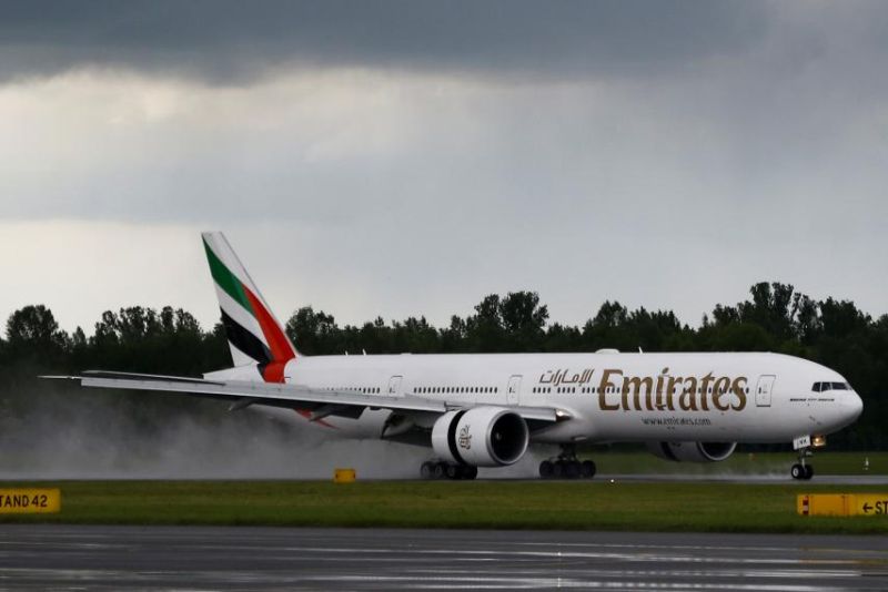 An Emirates Boeing 777-300 ER aircraft lands at the Chopin International Airport, Warsaw, Poland, May 17. An Emirates aircraft crash-landed at Dubai International Airport on Wednesday. KACPER PEMPEL/REUTERS