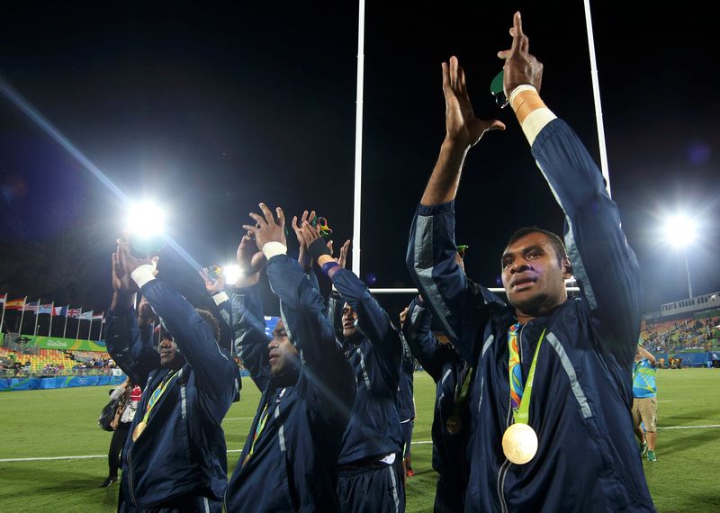 Fiji's players celebrate with their gold medals after winning the men's rugby sevens at the Deodoro Stadium, Rio de Janeiro August 11, 2016. u00e2u20acu201d AFP pic