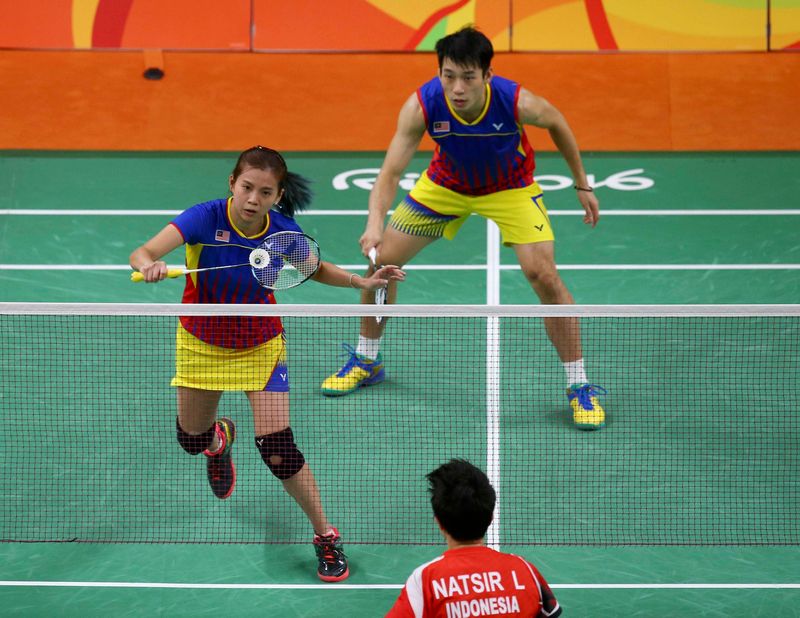 Goh Liu Ying (left) in action with Chan Peng Soon during the badminton mixed doubles final at Riocentro Pavilion 4, Rio de Janeiro August 17, 2016. u00e2u20acu201d Reuters pic