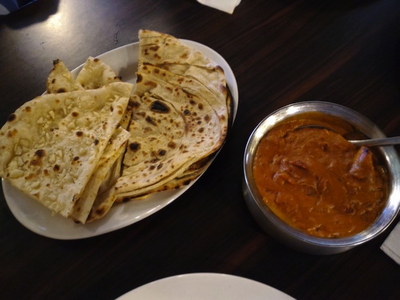 Garlic naan, tandoori paratha and butter chicken. — Picture by Alan Wong