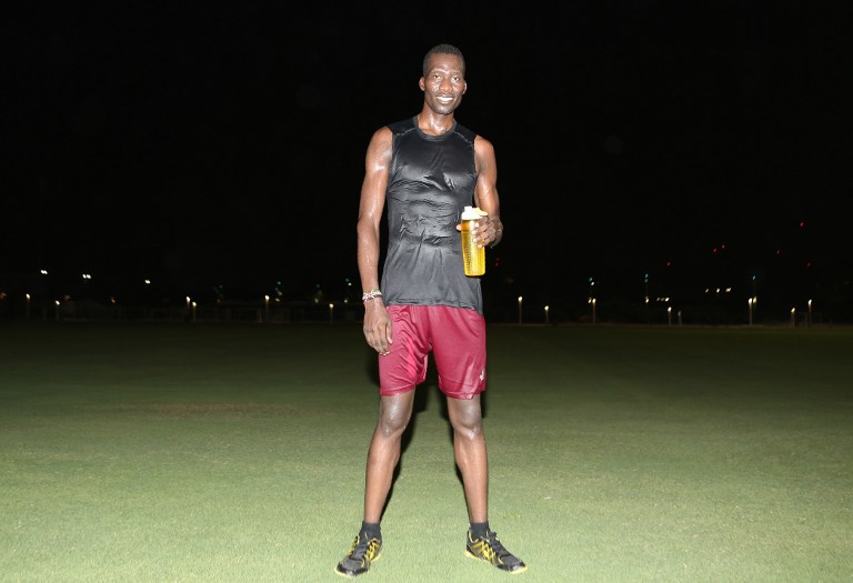 Kenyan runner Michael Douglas Ongeri poses for a photo on August 16, 2016 in the Qatari capital Doha. u00e2u20acu201d AFP pic