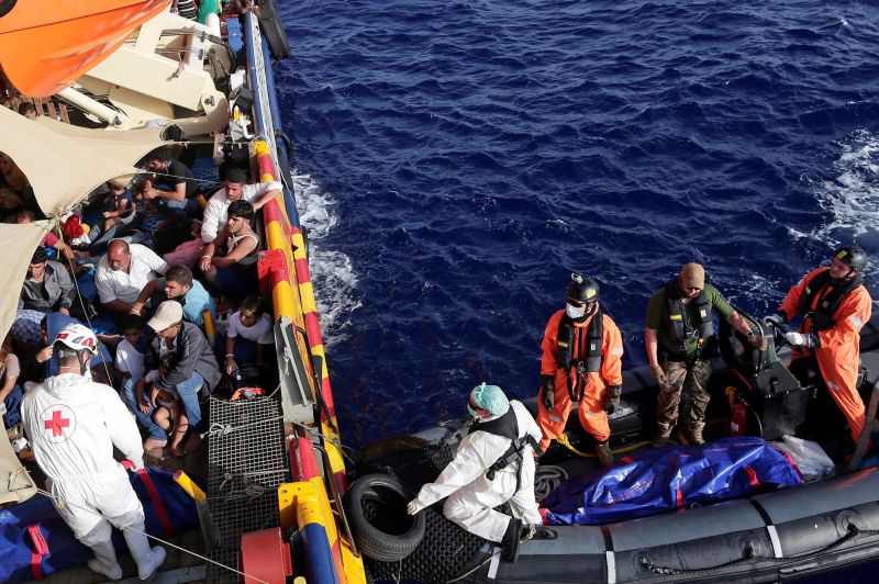 The bodies of two girls, aged eight months and five years, are recovered by Italian Red Cross members aboard the Phoenix vessel as part of the Migrant Offshore Aid Station (MOAS) operation off the coast of Libya August 18, 2016. reuters