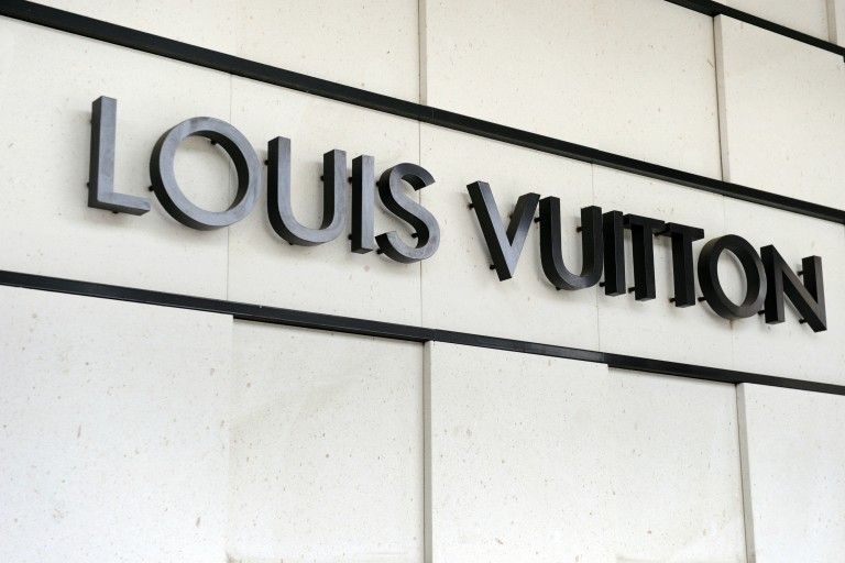 The logo of the French handbag company Louis Vuitton, part of the worldu00e2u20acu2122s biggest luxury group LVMH. u00e2u20acu201d AFP pic