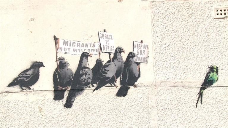 A Banksy mural painted over by a UK resortu00e2u20acu2122s street cleaners. u00c2u00a9 AFP