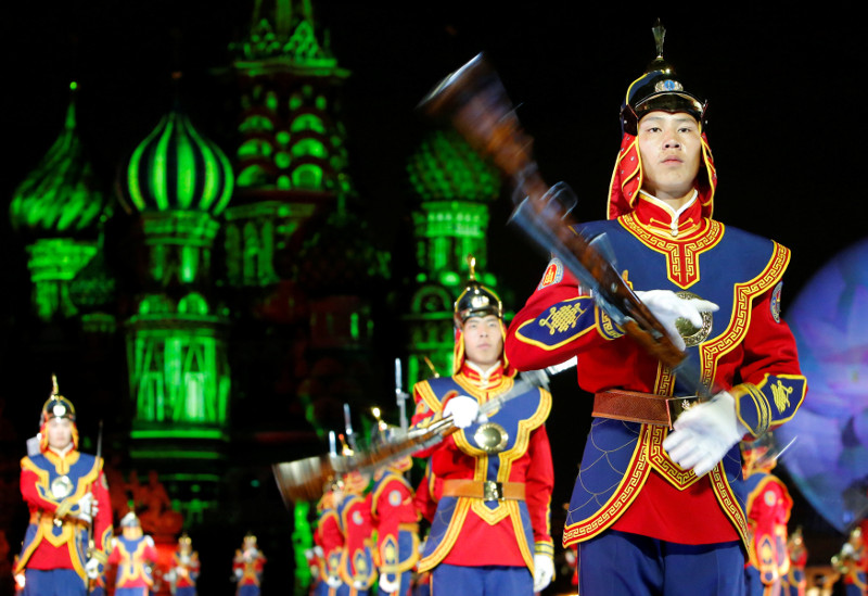 Members of the Honour Guard and military band of the Mongolian armed forces perform during the International Military Music Festival in Red Square, Moscow, Russia, August 26, 2016. u00e2u20acu201d Reuters pic
