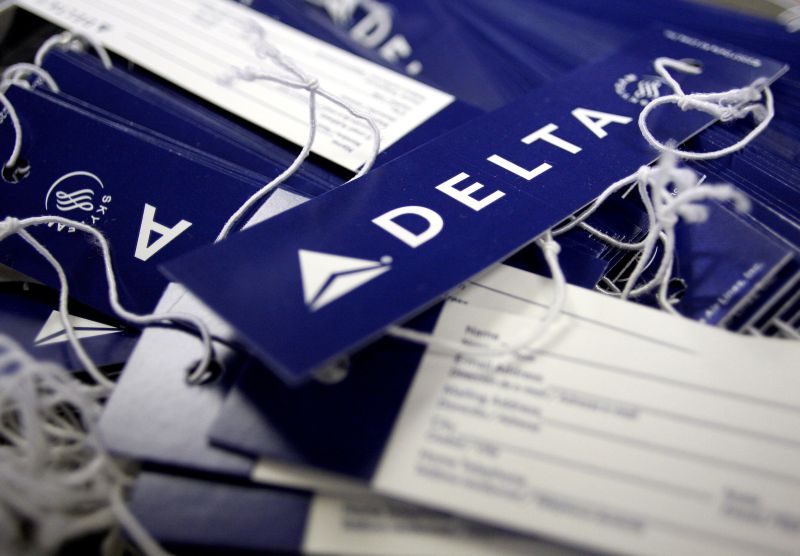 Delta Air Lines name tags are seen at Delta terminal in JFK Airport in New York, July 30, 2008. REUTERS/Joshua Lott/File Photo