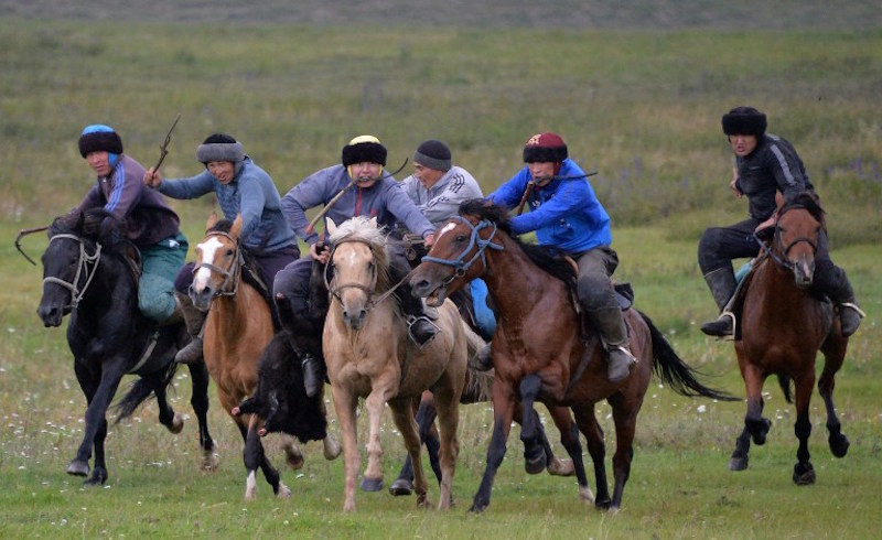 Kyrgyz team riders play the traditional central Asian sport Kok-boru, also known as Buzkashi or Ulak Tartis (u00e2u20acu02dcgoat grabbingu00e2u20acu2122), during a training session at the Suusamyr plateau, 2,500m above the sea level, some 300km from Bishkek, August 7, 2016. u00e2u20acu201d 