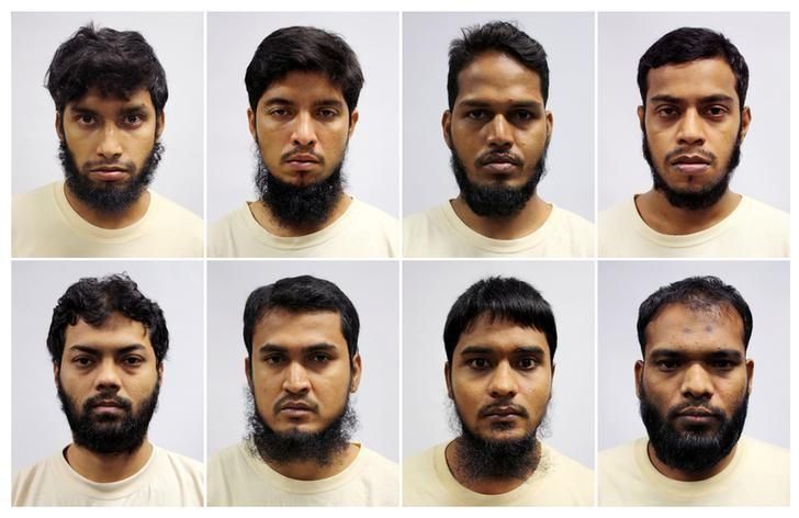 A combination of mugshots of Bangladeshi construction and marine industry workers in Singapore, charged for financing terrorists in Bangladesh. Reuters file pics