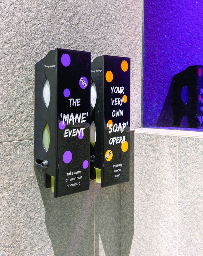 The soap and shampoo dispensers are labelled in a witty fashion to enliven the hostel experience. — Handout via TODAY