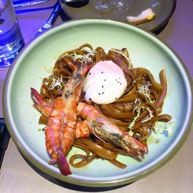At the bistro, dishes are served with a local twist like this Dry Prawn Noodles. — Handout via TODAY