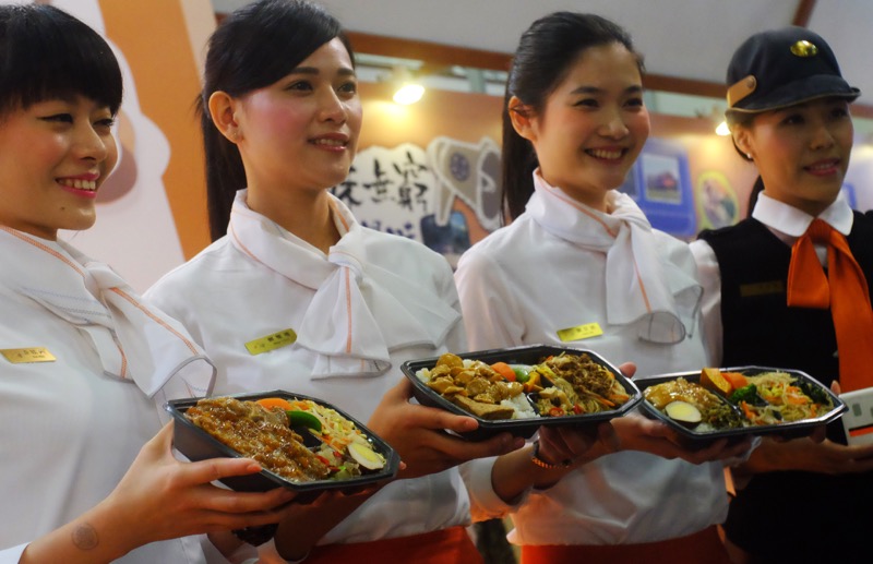 Train attendants from the different routs demonstrate their lunch boxes during the 2016 Taiwan Culinary Exhibition in Taipei on August 5, 2016. u00e2u20acu201d AFP pic