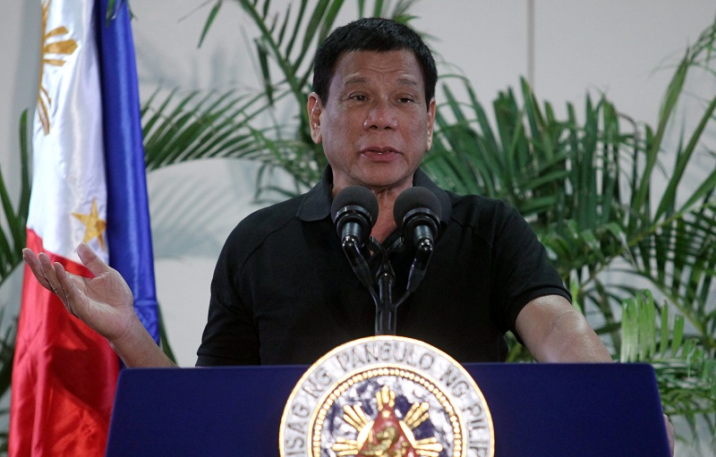 Philippines President Rodrigo Duterte gestures during a news conference upon his arrival from a state visit in Vietnam at the International Airport in Davao city, nPhilippines September 30, 2016. REUTERS/Lean Daval Jr TPX IMAGES OF THE DAY