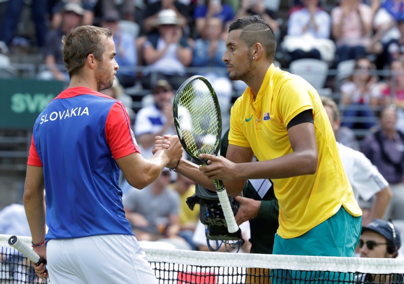 Australiau00e2u20acu2122s Nick Kyrgios (right) meets Slovakiau00e2u20acu2122s Andrej Martin at the net after his Davis Cup World Group Play-off mensu00e2u20acu2122 singles win at Homebush Tennis Centre, Sydney, Australia, September 16, 2016. u00e2u20acu201d Reuters pic