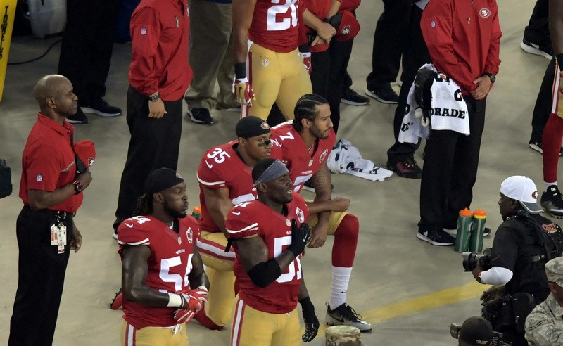 San Francisco 49ers quarterback Colin Kaepernick (7) and free safety Eric Reid (35) kneel during the playing of the national anthem before a NFL game against the Los Angeles Rams at Leviu00e2u20acu2122s Stadium Santa Clara, California September 12, 2016. u00e2u20acu201d Picture 