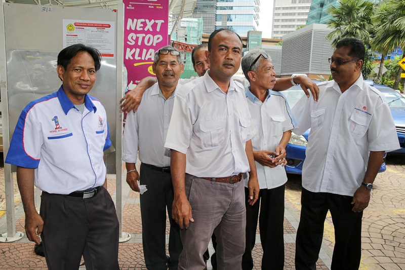 Between hope and despair: Older taxi drivers find it hard to transition to the new ride-hailing business model.