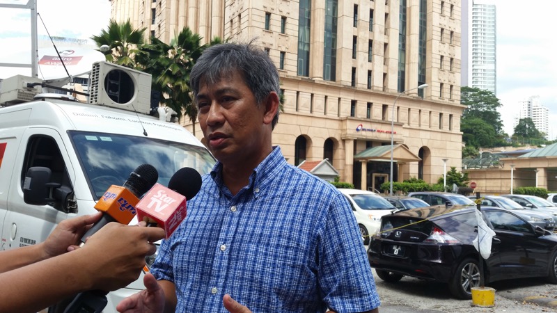 Bursa  Malaysia Chief Executive Datuk Seri Tajuddin Atan speaks to the media outside the Bursa Malaysia building, September 30, 2016. — Photo by Ida Lim 