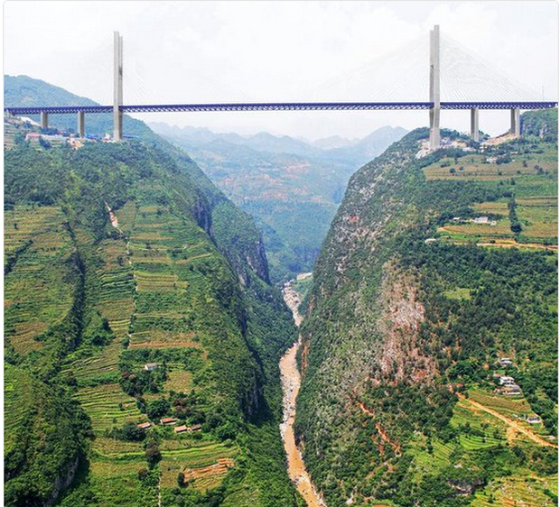 The Beipanjiang Bridge, in mountainous southwestern China, soars 565 metres (1,854 feet) above a river. u00e2u20acu201d Twitter screencap