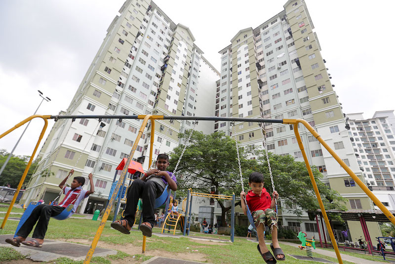 Children play in the small playground at the Kota Damansara PPR. u00e2u20acu201d Picture by Choo Choy May