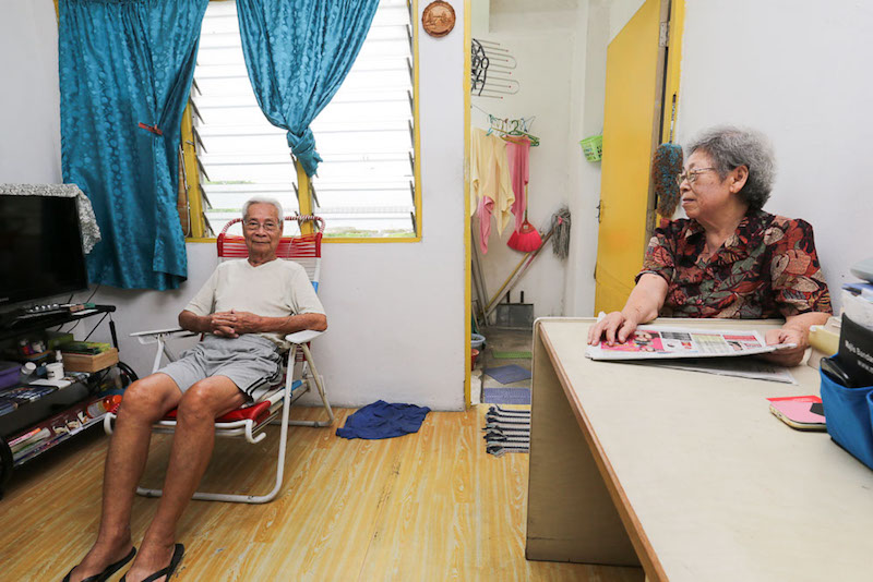 Toh Hoe Kit and Chan Yoke Chan (right) live alone in a Kota Damansara PPR unit. — Picture by Choo Choy May