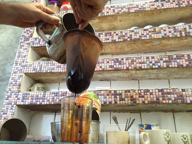 The last cup of coffee being prepared at the 100-year-old Kong Thai Lai coffeeshop, September 26, 2016. — Picture by KE Ooi