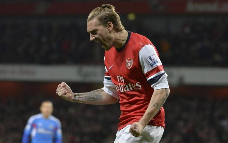 File picture shows Arsenalu00e2u20acu2122s Nicklas Bendtner celebrating after scoring during their English Premier League soccer match against Hull City at the Emirates stadium in London December 4, 2013. u00e2u20acu201d Reuters pic