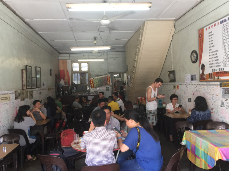 The last day... Kong Thai Lai Coffeeshop is packed with customers on its final day before it closes for good in this location where it has been in business for almost 100 years. — Picture by Opalyn Mok