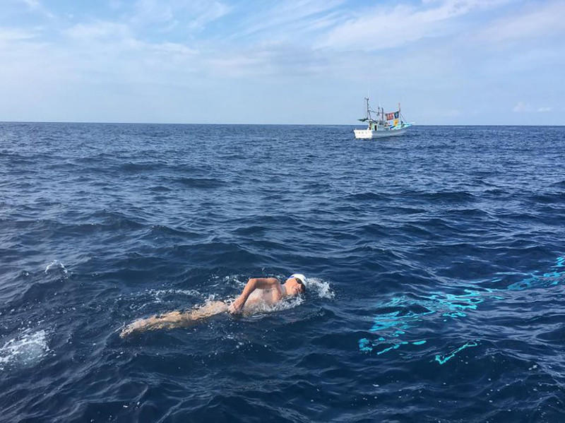 Picture released by Ocean Navi via Channel Swim Japan on September 7, 2016 shows 73-year-old Japanese swimmer Toshio Tominaga (bottom) swimming in his challenge to become the worldu00e2u20acu2122s oldest person to swim across the country's Tsugaru Strait. u00e2u20acu201d AFP pic