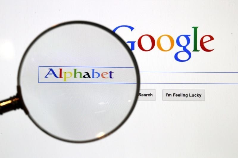 A Google search page is seen through a magnifying glass in this photo illustration taken in Berlin, August 11, 2015. u00e2u20acu201d Reuters pic