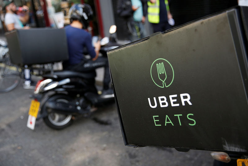 An UberEATS food delivery courier stands in front of his bike in London, Britain September 7, 2016. u00e2u20acu201d Reuters pic 