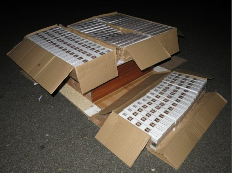 Abdul Rashid retrieved the duty-unpaid cigarettes from the wooden frames. u00e2u20acu201du00c2u00a0Picture courtesy of  Singapore Customs 