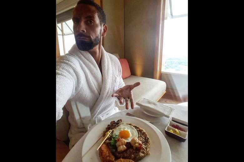 The picture that former Manchester United defender Rio Ferdinand tweeted of himself eating u00e2u20acu02dcnasi gorengu00e2u20acu2122 in Singapore, starting a food fight involving Indonesia, Singapore and Malaysia . u00e2u20acu201d @RIOFERDY5/TWITTER pic