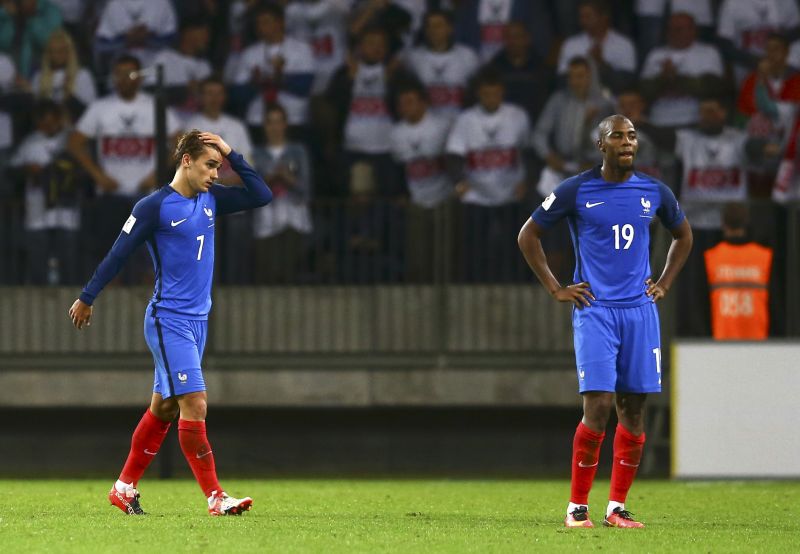 Franceu00e2u20acu2122s Antoine Griezmann and Djibril Sidibe look dejected after the match against Belarus at the Borisov Arena in Borisov, Belarus. u00e2u20acu2022 Reuters pic