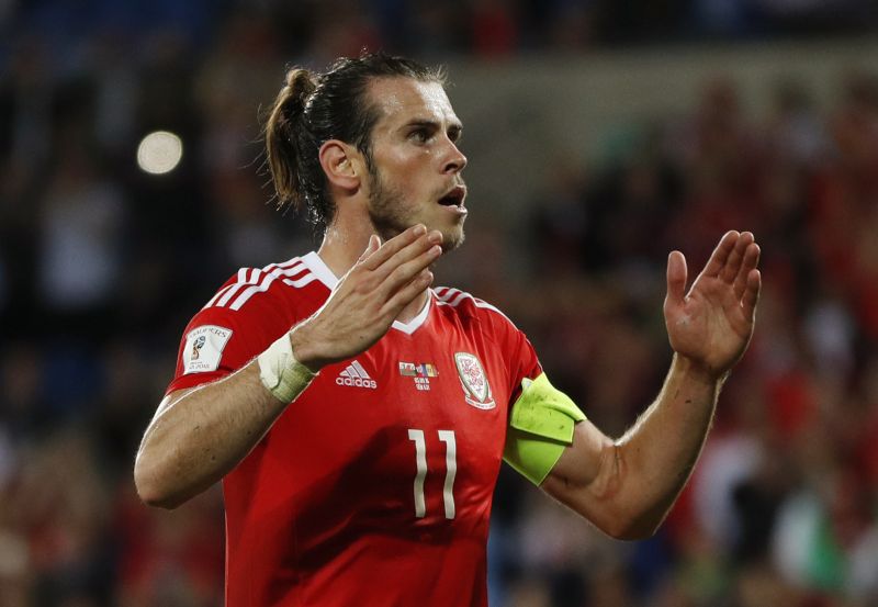 Gareth Bale celebrates scoring the fourth goal for Wales from the penalty spot. u00e2u20acu2022 Reuters pic