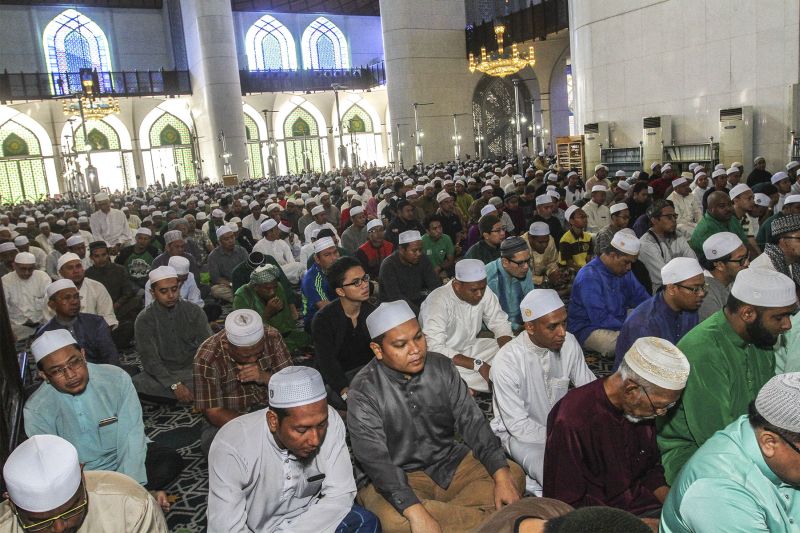 Muslims attend funeral prayers in absentia for the late Datuk Dr Haron Din at the Sultan Salahuddin Abdul Aziz Shah Mosque in Shah Alam, September 17, 2016. u00e2u20acu2022 Picture by Yusof Mat Isa
