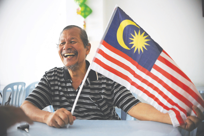 Md Redzuan, a soldier turned historian, was inspired by his love for the country to come up with the name Jalur Gemilang. u00e2u20acu201d Picture by Mukhriz Hazim