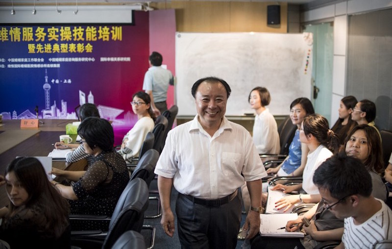 Shu Xin, the head of Weiqing, speaks to his colleagues during a meeting at their office in Shanghai July 8, 2016. u00e2u20acu201d AFP pic