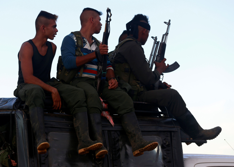 Fighters from Revolutionary Armed Forces of Colombia (FARC), arriving at the camp where they prepare for an upcoming congress ratifying a peace deal with the government, near El Diamante in Yari Plains, Colombia, September 16, 2016. u00e2u20acu201d Reuters pic