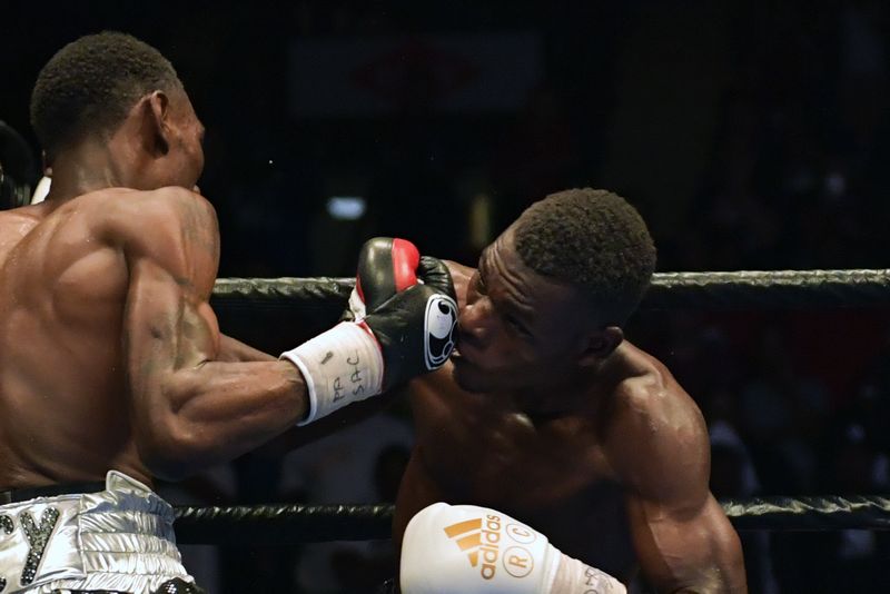 Robert Easter Jr (left) punches Richard Commey during the IBF lightweight championship fight in Reading, Pennsylvania September 9, 2016. u00e2u20acu201d AFP pic