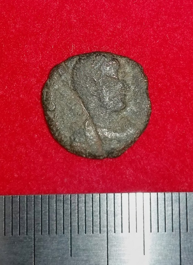 This handout photo released on September 26, 2016 shows a fourth-century copper coin from ancient Rome after it was unearthed in Japanu00e2u20acu2122s Okinawa island together with other coins. u00e2u20acu201d AFP pic