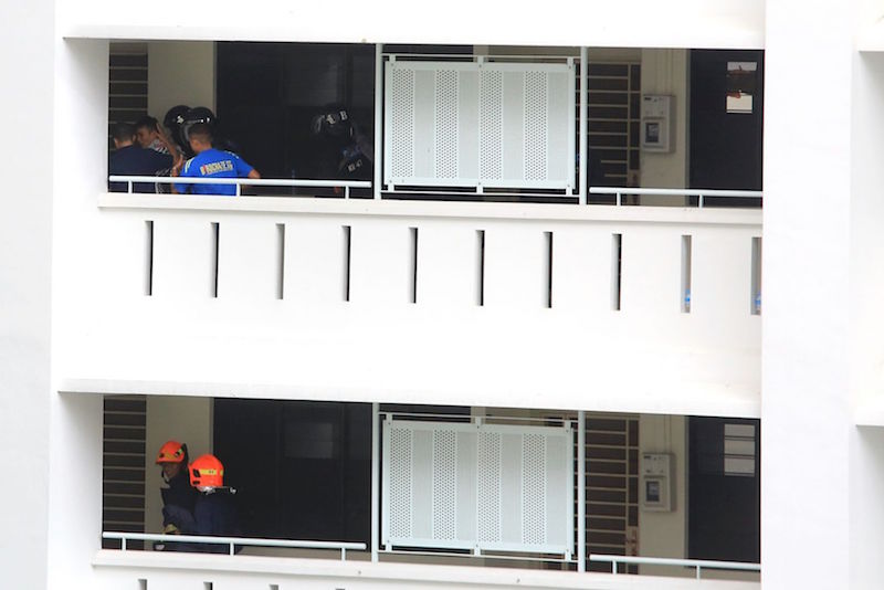 Police have detained the 39-year-old man behind a 17-hour standoff in a Sembawang Drive flat, after breaking into the unit and rescuing a two-year-old boy held hostage since September 27, 2016. u00e2u20acu201d TODAY pic
