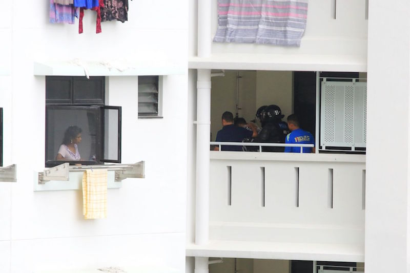 Police have detained the 39-year-old man behind a 17-hour standoff in a Sembawang Drive flat.u00c2u00a0u00e2u20acu201d Picture courtesy of Koh Mui Fong 