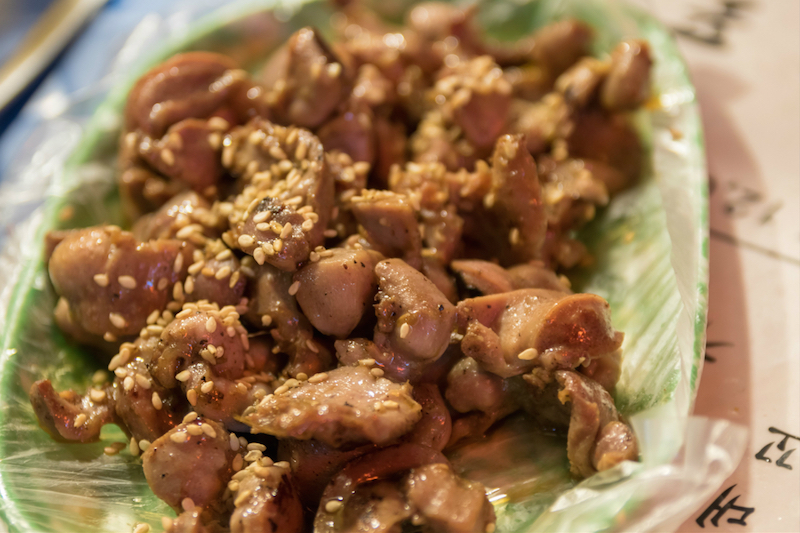 Chicken gizzards, a popular staple, at Mokpo House soju tent. — Reuters pic