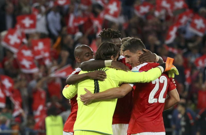 Switzerland's goalkeeper Yann Sommer, Gelson Fernandes, Johan Djourou and Fabian Schaer celebrate after defeating Portugal. u00e2u20acu2022 Reuters pic