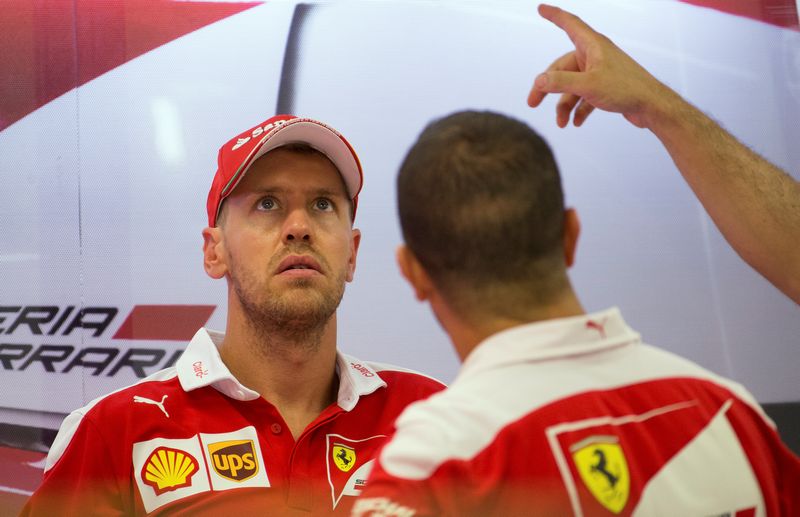 Ferrari's Sebastian Vettel of Germany is seen in the team garage at the Marina Bay street circuit ahead of the Singapore F1 Grand Prix Night Race September 15, 2016. u00e2u20acu201d Reuters pic 