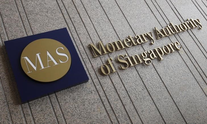 The logo of the Monetary Authority of Singapore (MAS) is pictured at its building in Singapore in this February 21, 2013 file photo. REUTERS/Edgar Su/Filesn