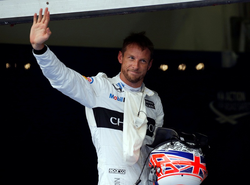 McLaren’s Jenson Button of Britain waves after qualifying session at Sepang October 1, 2016.