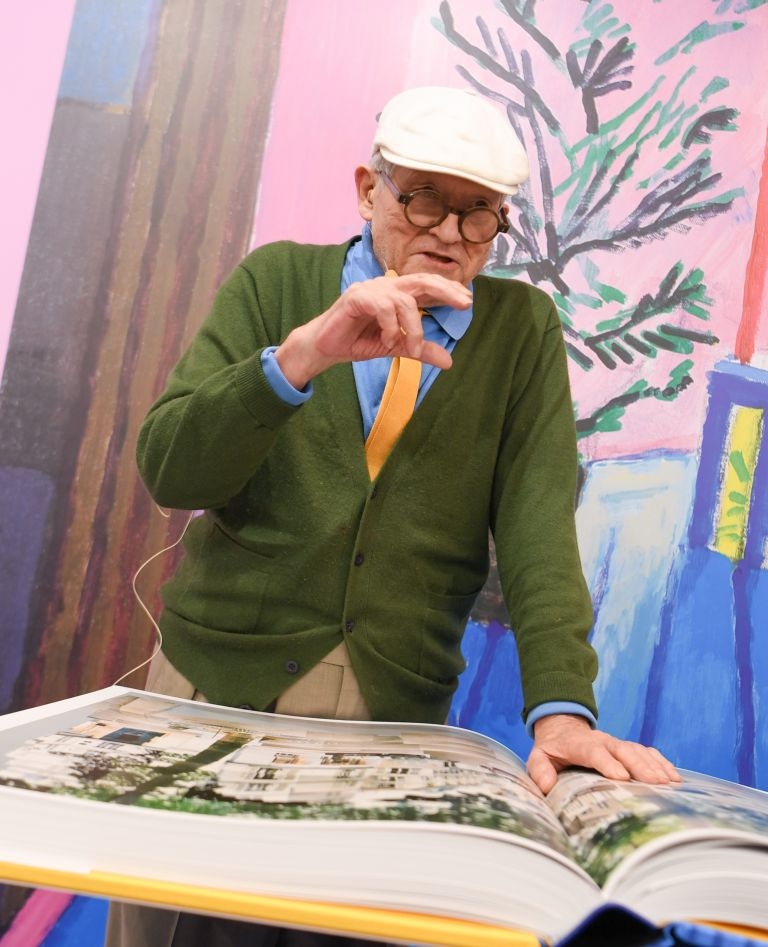British artist David Hockney poses with his book u00e2u20acu02dcSUMO - A Bigger Booku00e2u20acu2122 during the Frankfurt Book Fair in Frankfurt am Main, western Germany, on October 19, 2016. u00e2u20acu201d AFP-Relaxnews pic